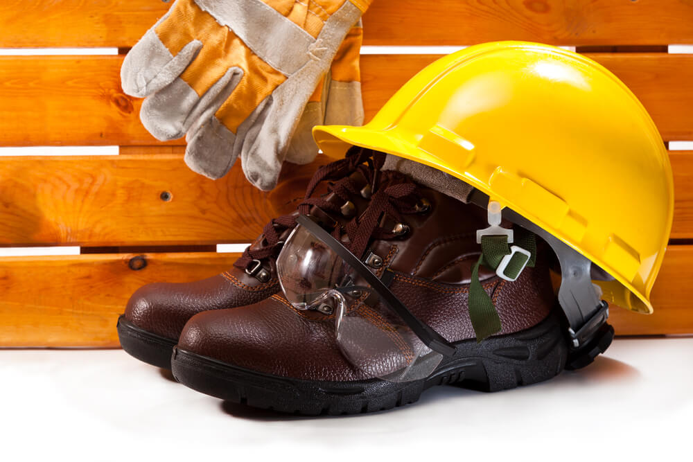 Work boots, helmet and work gloves